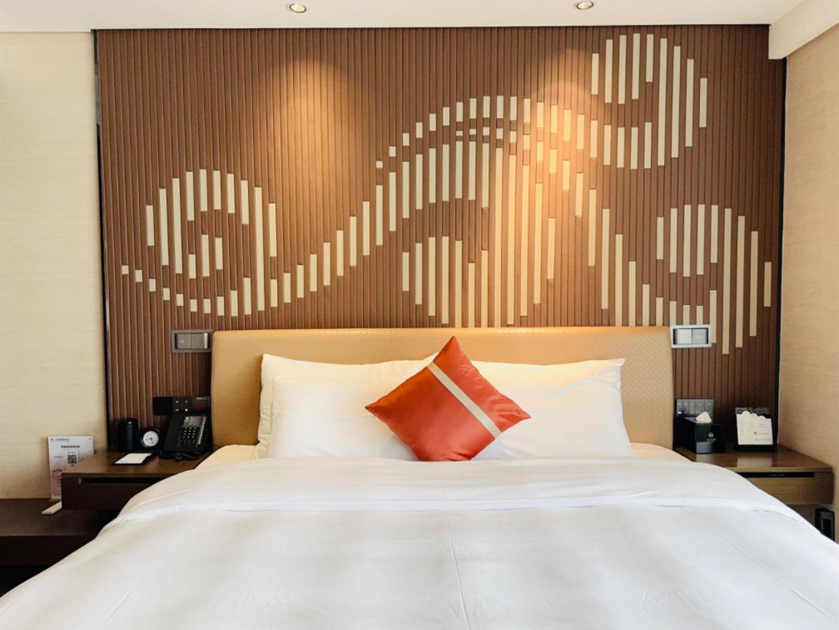 Guangzhou Baiyun Hotel Exterior foto A bedroom at the hotel